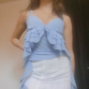 S/M. 100% polyester. Light weight somewhat meshed.